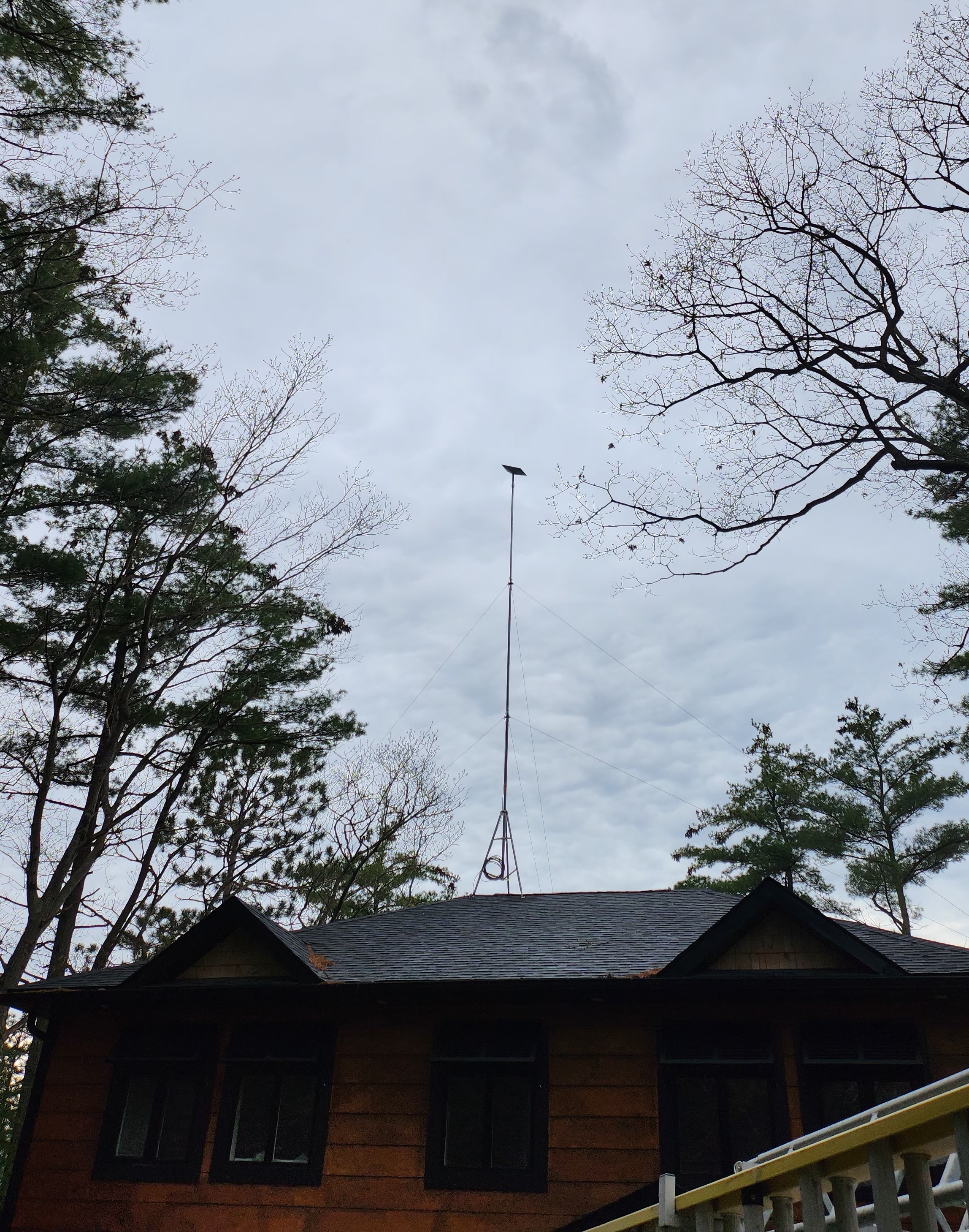 30 foot tall rooftop tripod on a gorgeous muskoka cottage