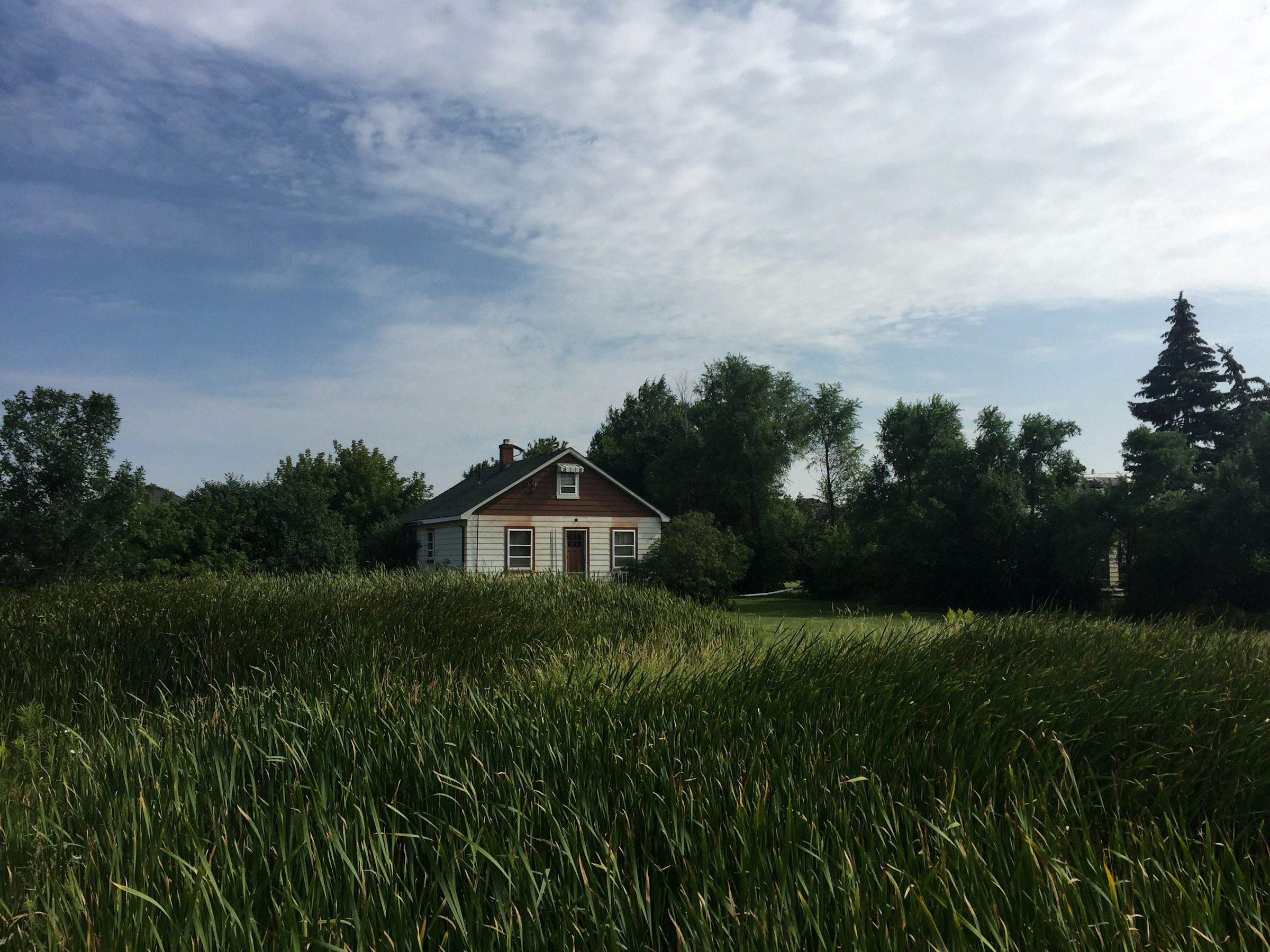 rural house in rolling fields