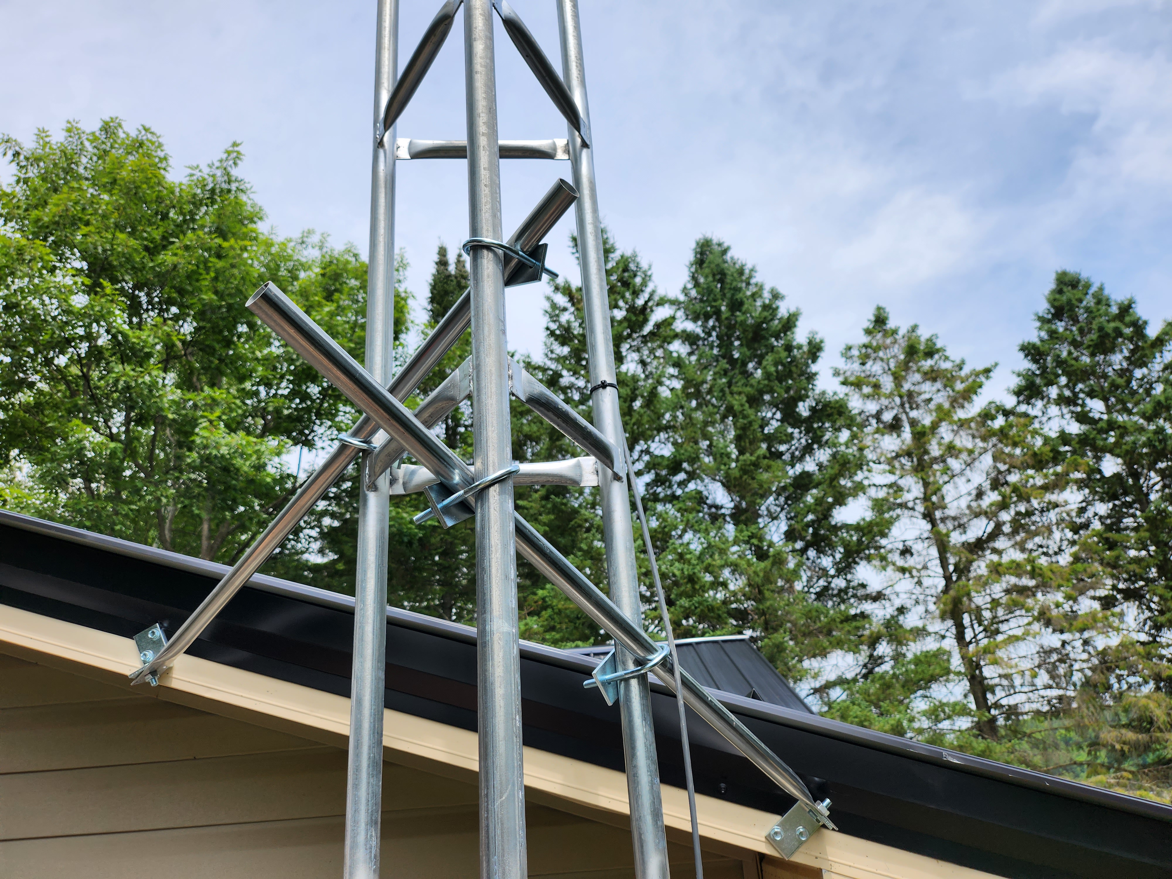 starlink tower attached to the side of a building